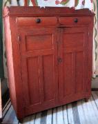 Painted red jelly storage cupboard